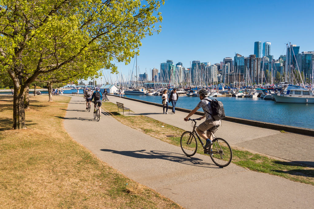 Vancouver, British Columbia, Canada - 14 September 2017: People riding bikes in Stanley Park.